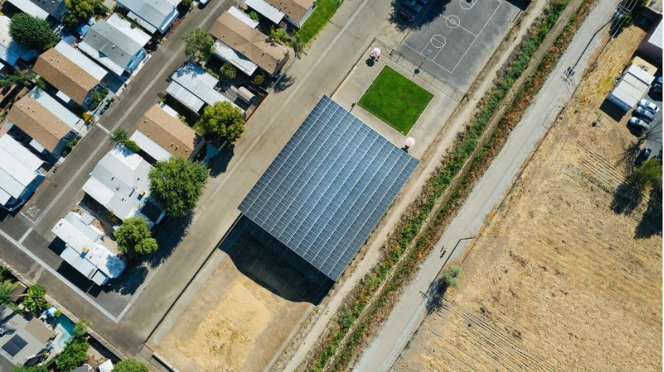 aerial view of solar-covered RV storage at a manufactured home community.